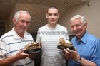Brothers Michael and Patsy O'Connor were both presented with the Hall of Fame awards at the West United AFC annual awards night at Monroes. Our photograph shows Conor Beatty, Club Secretary, presenting Michael (left) and Patsy with their awards.