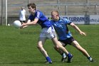 <br />
Salthill-Knocknacarra's, Matthew Heskin,<br />
and<br />
St. Michaels, David Cunnane,<br />
during the Senior Football Championship at Pearse Stadium.
