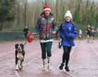 Irene Carroll and her daughter Elodie, Rosscahill, with their pet Scamper taking part in the Goal Mile at Dangan on Christmas Day.
