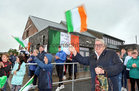 Maria Glynn from Rooaunmore waving the Irish flag for Cillín Greene as he arrives to the homecoming celebrations at Claregalway GAA Club grounds, Knockdoemore.