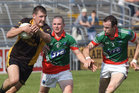 <br />
Kilconly's, Kevin Brady and Barry Steede,<br />
and<br />
 Leitir Moir's, Antaine O Griofa,<br />
during the Senior Football Championship at Pearse Stadium.
