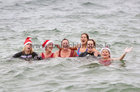 Catriona Ryan, Tara Ryan, Natalie Sheehy, Mary Cullinane, Gail Cullinane and Gina McAfee, all of Galway city, enjoying their swim at Blackrock on Christmas Day.