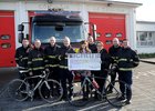 Fire Fighters Present Cheque
