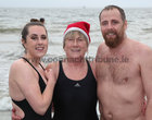 Sarah Withero, Dangan, with her daughter Carra and son Cormac after their Christmas Day swim for Pieta House at Blackrock.
