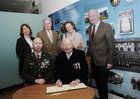 <br />
Lt Col (Retired) Ned Cusack Moycullen signs the distinguished Visitors book at his hundred Birthday celebrations at Dun UI Mhaoiliosa, Renmore with Lt Col Frank Flannery, OC 1CnCois and family Maeve, Eamon, Rosemary  and Jim 