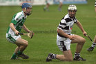 Sarsfields, Noel Kelly,<br />
and<br />
Turloughmore's, Daithi Burke,<br />
during the Senior Hurling Championship at Athenry.