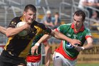<br />
Kilconly's, Barry Steede,<br />
and<br />
 Leitir Moir's, Antaine O Griofa,<br />
during the Senior Football Championship at Pearse Stadium.