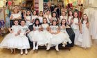 The girls who modelled at Anthony Ryans annual Communion Wear Fashion Show in the Shop Street store last Sunday.