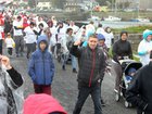 The Galway Memorial Walk in aid of Galway Hospice sets off from the Claddagh during wet and windy weather last Sunday.