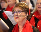 Carmel Lynch of the Mervue Folk Choir  during their Annual Christmas Mass performance in the The Holy Family Church, Mervue. Following the removal of Covid restrictions it was the choir’s first Christmas Mass performance since the start of the pandemic. It was also the last Mass performance by the choir under the directorship of Ronnie Lawless who has stepped down after 44 years. 