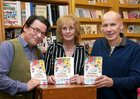 Rita Ann Higgins with Vinny Browne and Charlie Byrne of Charlie Byrne's Bookshop at the launch of her book of essays and poems, ‘Our Killer City: isms, chisms, chasms and schisms’, in Charlie Byrne’s.