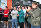 Some of Cillín Greene’s friends, who all played football together for Claregalway since they were children, applaud as Cillín arrives at the homecoming celebrations at Claregalway GAA Club grounds, Knockdoemore.