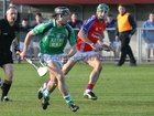 Liam Mellows, Brian Lee,<br />
and<br />
St. Thomas, David Burke,<br />
during the Senior Hurling Championship at Athenry.