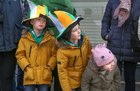 Young spectators waiting for the St Patrick's Day Parade in the city at Eglinton Street