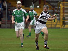 Sarsfields, Niall Quinn,<br />
and<br />
Turloughmore's, Francis Forde,<br />
during the Senior Hurling Championship at Athenry.