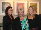 Geraldine Warren with her neices Laura and Rachel Walsh at the opening of artist Maurice Walsh's exhibition at the Town Hall Theatre.