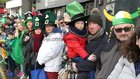 Some of the thousands of spectators watching the St Patrick's Day Parade in the city.