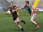 <br />
Kilconly's, Martin Newell,<br />
and<br />
 Leitir Moir's, Fiachra Breathnach,<br />
during the Senior Football Championship at Pearse Stadium.
