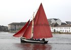 The restored 137 year-old Gleoiteog, the Lovely Anne, sails into Claddagh Quay during it’s relaunch