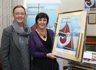 Ann Crean, Early Childhood Services (left) and Joan Carr (sister of Chris Montague), at the Cillin at Bearna Church for the launch of 'The Journey', prints of the late Chris Montague's painting in aid of the Early Learning Services for Early Intervention for children with Down's Syndrome in Galway.