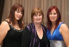 Bernie Lohan Kilconieron, with her daughters Tracey (left) and Gina at the County Galway Charity Mayoral Ball at the Lough Rea Hotel.