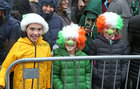 All smiles during the wet weather at the St Patricks Day parade in the city centre.