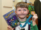Naoise Hackett O'Connor at the presentation of certificates of Achievement to children who participated in the Summer Stars Library Reading Adventure at Ballybane Library.