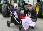 Gerard Rooney from Craughwell with his daughters Lilly (4) and Abby (2) at Athenry Mart before the start of the East Galway Tractor Run in aid of Hand in Hand, the Children's Cancer Charity. 