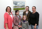 Bridie Dubber from Renmore with her daughter Lorna Gray, and her granddaughters (from left) Chloe, Tara and Aoife, at the opening of artist Geraldine Folan's exhibition, “A Year on the Prom”, at the Connacht Tribune Printworks Gallery in Market Street.