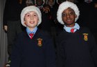 Danial Geoghegan, and Edric Opobu, Boys from St. Patricks School Lombard Street, Singing Carols Fundraising for Galway Hospice. 