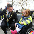Little Blue Hero Molli De Búrca from Rosmuc meets with Mayor of Galway, Cllr Eddie Hoare at Eyre Square last Friday during the arrival of The Maynooth Students for Charity Galway Cycle. The cycle, from Maynooth and back, covering 400 kilometers in total, was held in aid of Little Blue Heroes.<br />
Little Blue Heroes Foundation is a charity voluntarily led by Garda members, retired Garda members and civic minded people from communities which is funded entirely by donations and fundraising. The foundation supports families of children with serious illnesses in Ireland while empowering the lives of children through positive community engagement. Their mission is to provide  support to families of children who have serious illnesses in Ireland while granting the wish of the children to become Honorary Gardaí to empower the child and foster positive engagement with An Garda Síochána. 