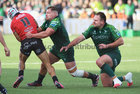 Connacht v Emirates Lions BKT United Rugby Championship game at Dexcom Stadium.<br />
Connacht's Tadgh McElroy and Jack Aungier and Edwill Van Der Merwe, Emirates Lions