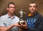 Tom Griffin, Club Treasurer (left) presenting the A Team Players Player of the year award to Kevin O'Brien at the West United AFC annual awards presentation night at Monroes.