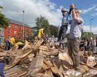 The People Build cardboard structure is trampled on for recycling after it was knocked down on Sunday.
