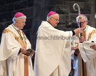 The retired Bishop of Galway, Most Rev Martin Drennan, hands over the crozier to Bishop Brendan Kelly, the new Bishop of Galway, Kilmacduagh and Apostolic Administrator of Kilfenora, at Galway Cathedral on Sunday. Included in the photograph is the Most Rev Michael Neary, Archbishop of Tuam.