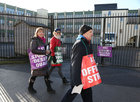 Teachers during the ASTI one day strike outside St Joseph's College at Nuns Island yesterday