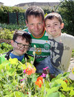Mark McLoughlin from Ballybane with his sons Evan and Leon at the Ballybane Community Garden Open Day.
