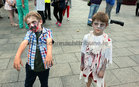 Zombies of all ages took part in the family friendly annual Galway Zombie Walk in aid of Jigsaw last Saturday evening. The walk ended with a fire show by performance group Hoopla Troupla in Fr Burke Park at Fr Griffin Road. Jigsaw Galway is a free, non-judgemental and confidential support service for young people living in Galway city and county.<br />
