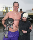 Drydan Geary and his daughter Lauren, Highfield Park, with their dog Bonnie after their Christmas Day swim at Blackrock.