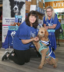 Geraldine Kennedy Hunt and Sandra Ferguson of MADRA with rescued dog Holly at their display at the the Petstop Galway Birthday Pawty in the Gateway Retail Park, Knocknacarra. 