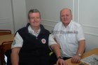 Ivor Gleeson and Brian Madden, of the Red Cross, at the Thermo King, Christmas Day dinner at the plant.