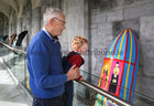Derek Brian Chadwick, Knocknacarra, and his grandson Rowan (2) admiring Jay Murphy’s exhibit, ‘The Puppet’s Return’, one of the 21 currach sculptures displayed in the Quadrangle at NUI Galway for Culture Night. The exhibition of the bespoke painted currachs, commissioned to celebrate 21 years of Árus Éanna, the Inis Óirr Arts Centre on The Aran Islands, was hosted by NUI Galway.