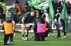 Connacht mascot Lochlan Cavanagh, a member of Galway Bay Rugby Club, poses for photographs with team captain Cian Prendergast before the start of the Connacht v Ulster BKT United Rugby Championship game at Dexcom Stadium last Saturday.