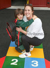 Joe Williams with his mother Edel after he finished his first day at Scoil Ide, Árd Na Mara, Salthill.