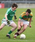 Renvyle v Caltra City and County Under 21 B Football Championship Final at the Pearse Stadium.<br />
Renvyle's Sean Salmon and Caltra's Peter Birch