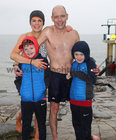 Maria and Billy King from Renmore with their sons Paul (left) and Christopher after their Christmas Day swim at Blackrock.