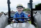 <br />
Dylan Hanley, on a vintage tractor, at the Corofin Festival. 