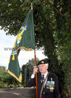 Tom Gunne with the Jadotville Flag at the annual wreath laying ceremony for IUNVA post 30 Galway and 60th Anniversary of the Siege of Jadotville in the Memorial Garden of Renmore Barracks.