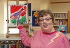 Denise Flaherty with some of her work at the opening of the RehabCare Art Exhibition in Ballybane Library.