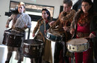 Members of the Macnas Drumming Ensemble performing at the opening of the Galway Theatre Festival in the O'Donoghue Centre for Drama, Theatre and Performance at NUI Galway.